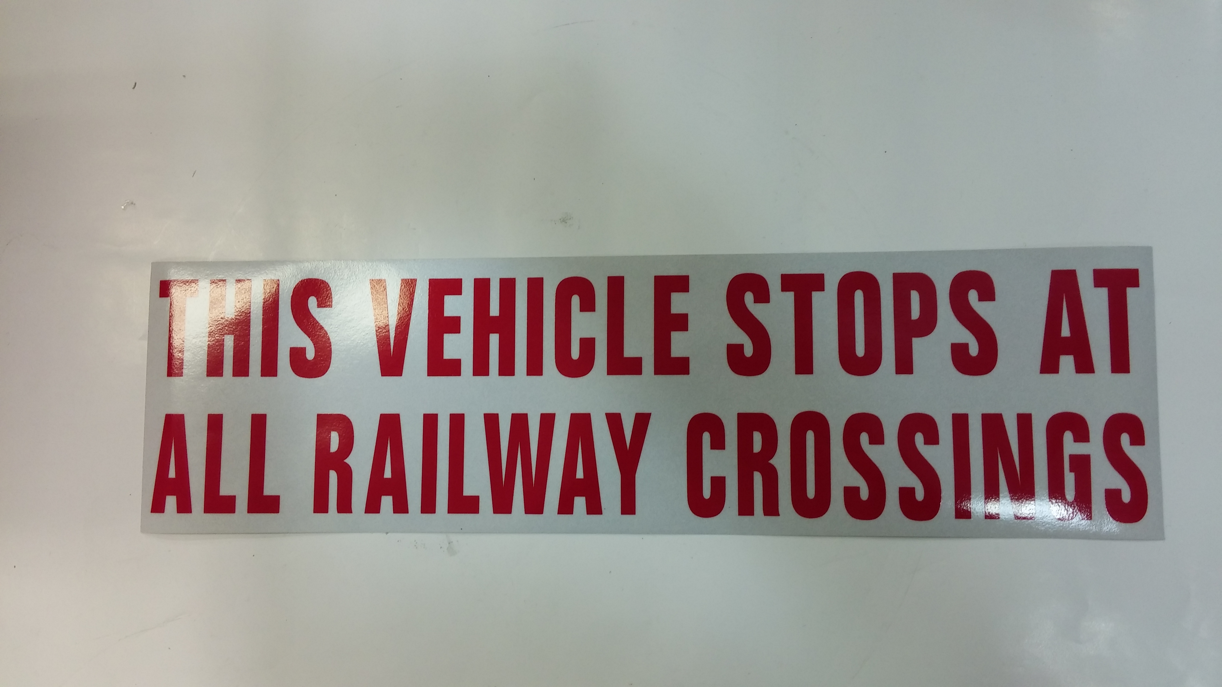 DECAL,VEHICLE STOPS,RED ON WHI