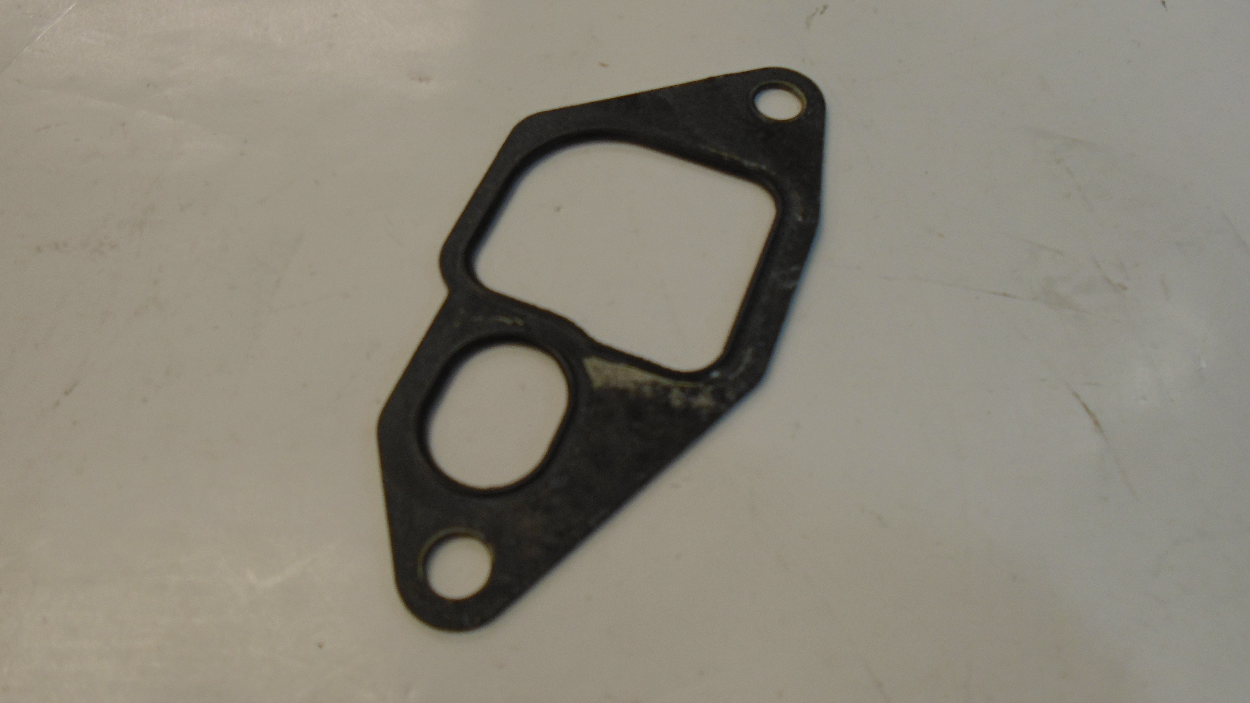 GASKET FRONT OIL COOLER HEADER