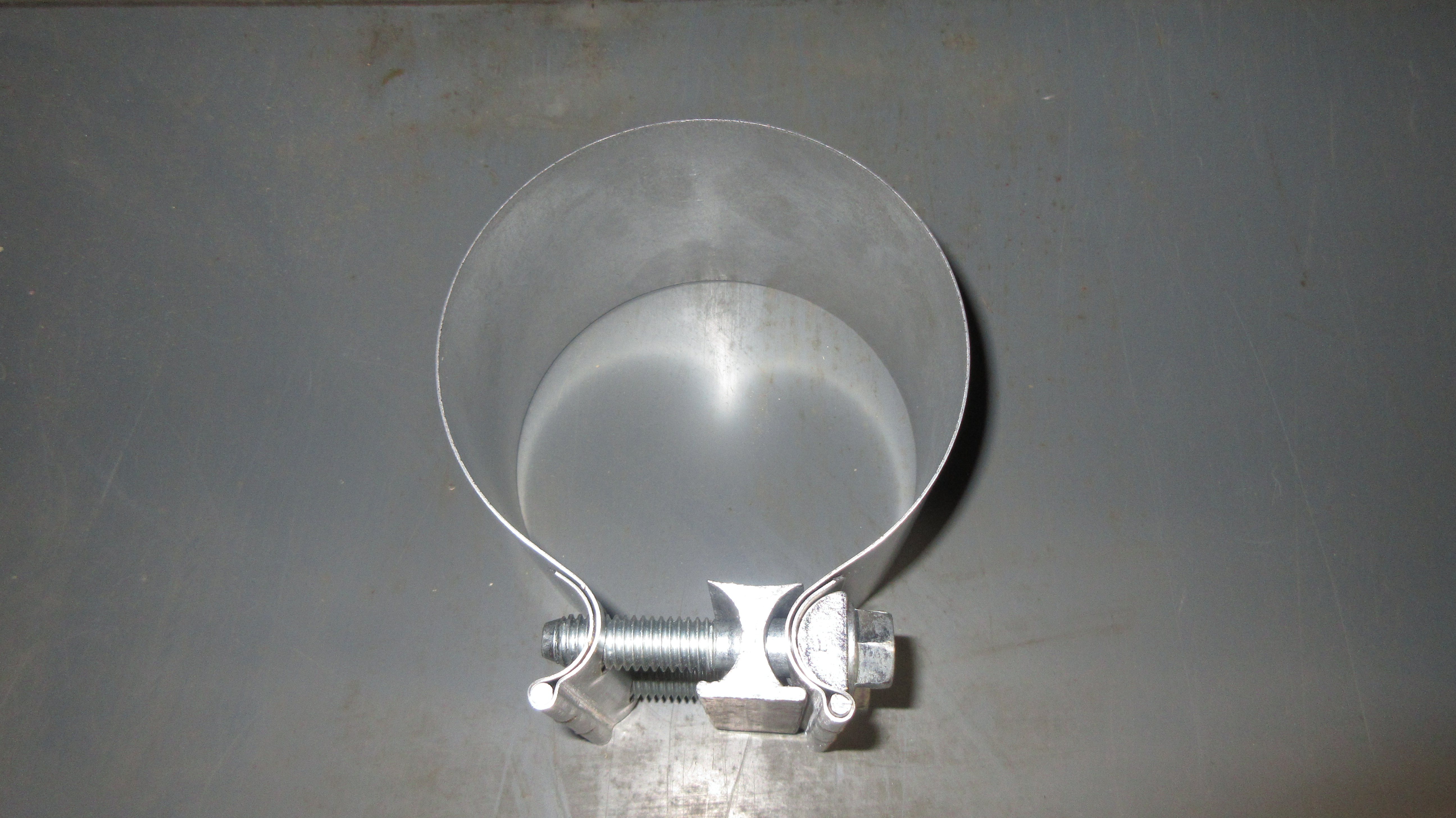 BRACKET,CLAMP, 4.0IN HD, PRE-F