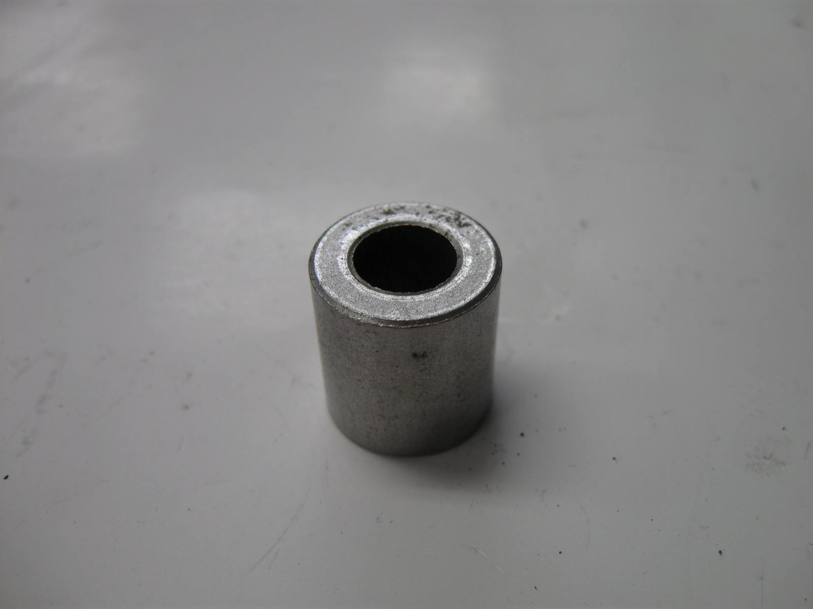 SPACER EXH MANIFOLD BOLT