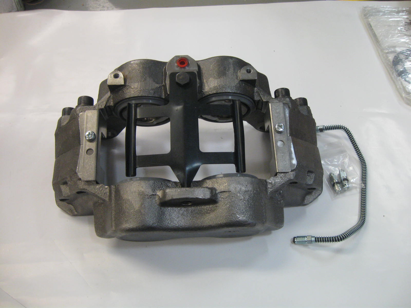 CALIPER,QUADRAULIC,LH/RH 09+IC